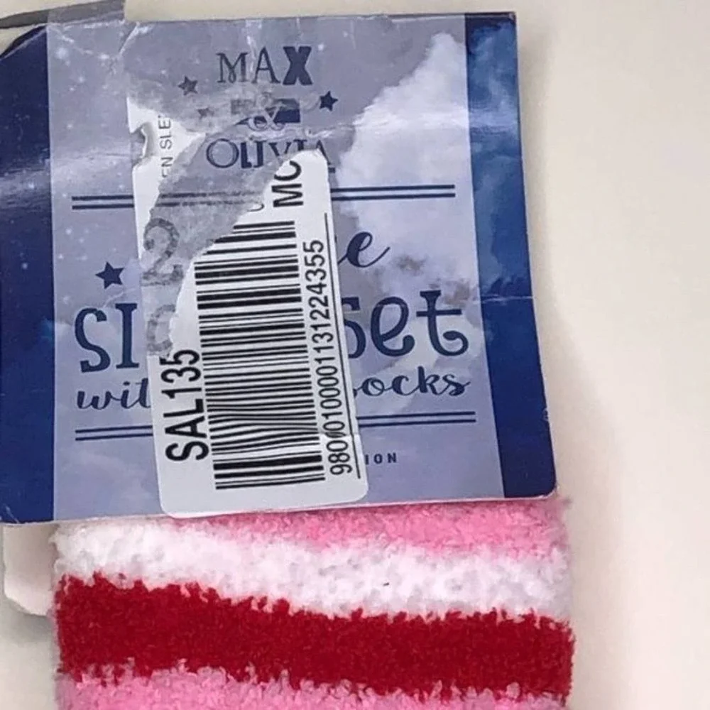 Max and Olivia Kids plush socks with gripping soles.